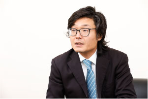 株式会社 沖データ様 生産統括本部 生産管理部 物流企画チーム 課長 國藤 仁